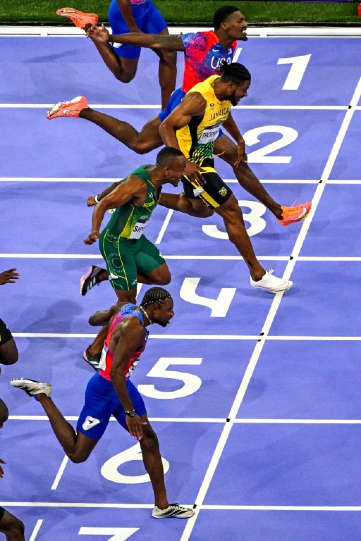 Close call: Noah Lyles (lane 7) edges out Jamaica's Kishane Thompson (4) and third-placed Fred Kerley (3) in the 100m final