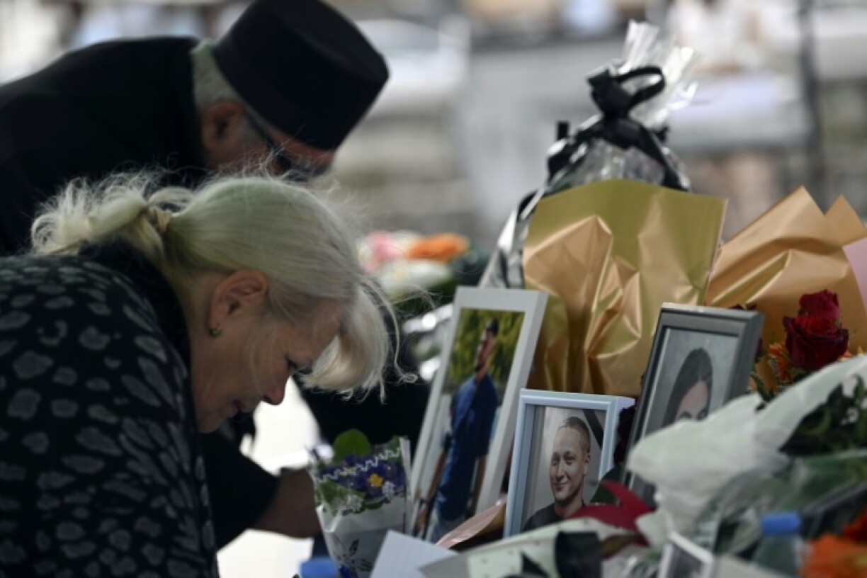Mourners left flowers and messages for the 59 people killed in the fire in Kocani
