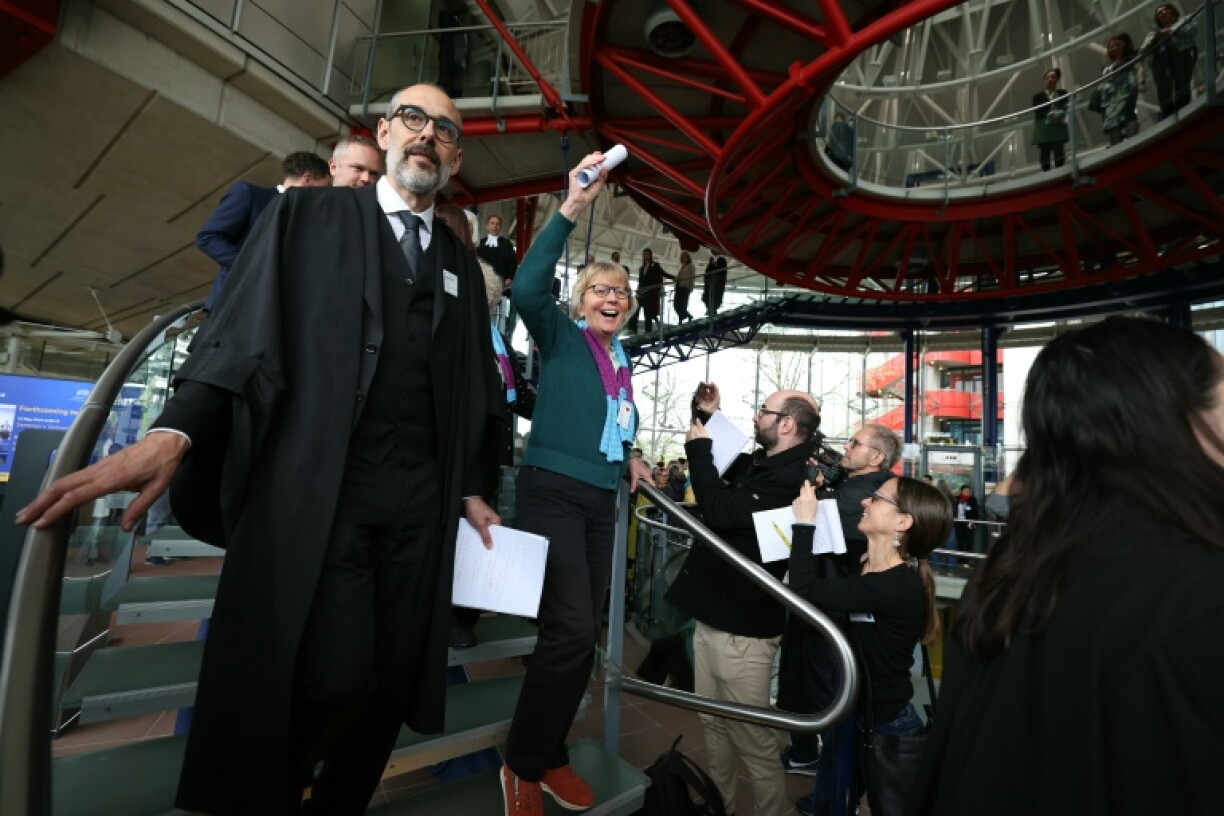 Swiss retirees celebrate a landmark victory at the European Court of Human Rights in April 2024, when the court for the first time found Switzerland responsible for failing to take sufficient action against climate change