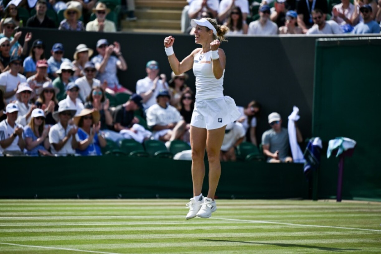 Germany's Laura Siegemund celebrates after beating Madison Keys at Wimbledon