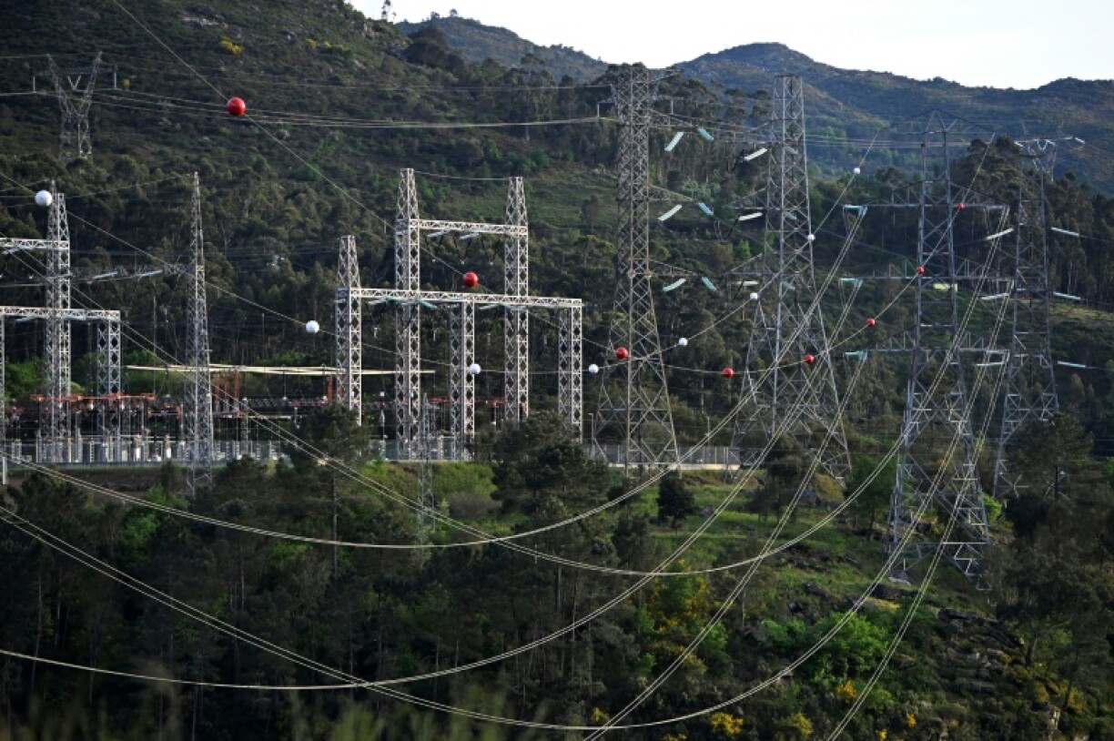 High-voltage transmission towers carrying electricity from Spain to Portugal near the border in Lindoso, Portugal, on April 28, 2025