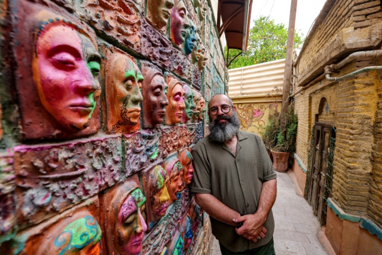 Adel Yazdi has over the years turned the walls of his old neighbourhood into a vivid visual tapestry 'telling the stories of the people living there'