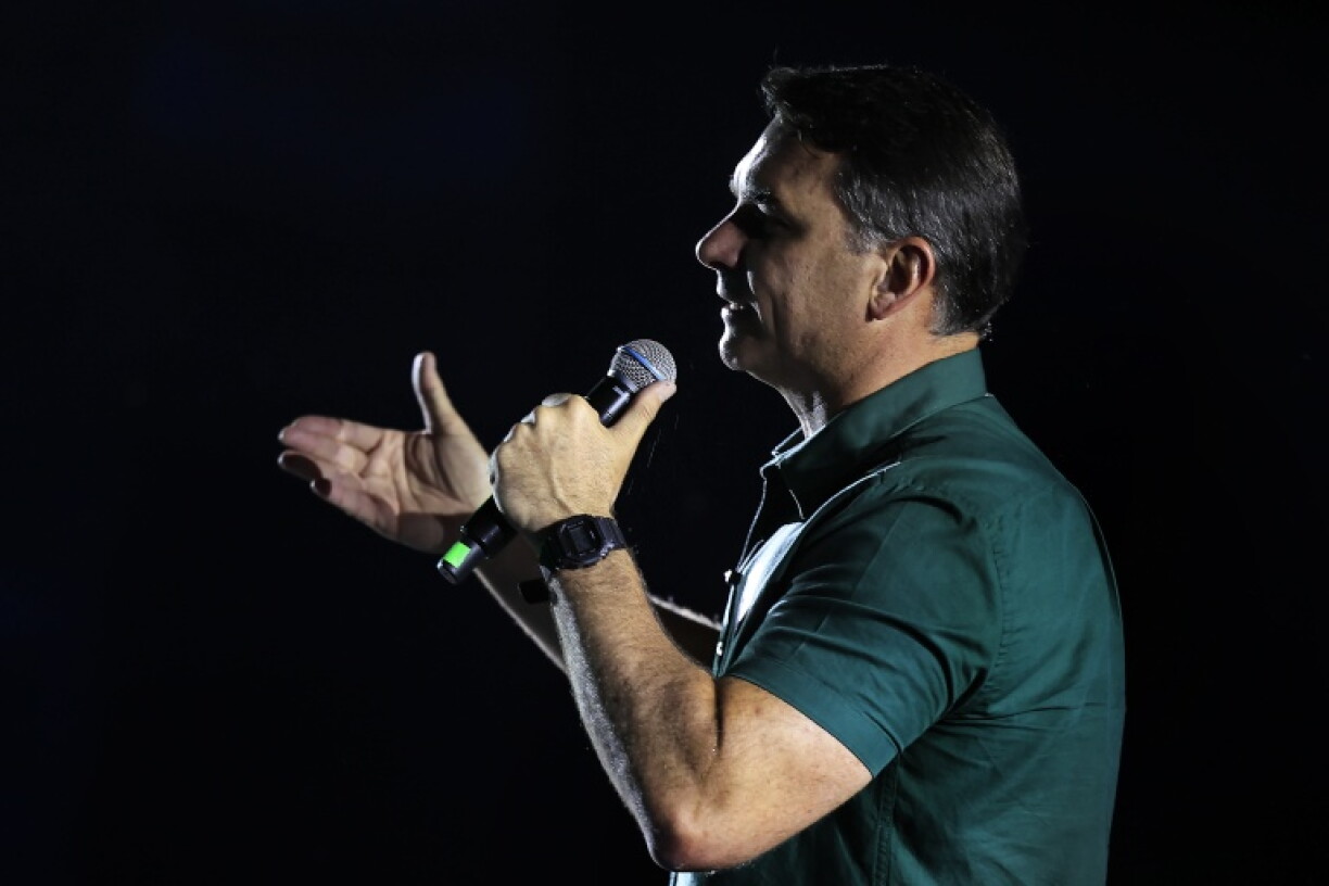 Brazil's right-wing senator and presidential candidate Flavio Bolsonaro addressing a campaign rally in Guarulhos