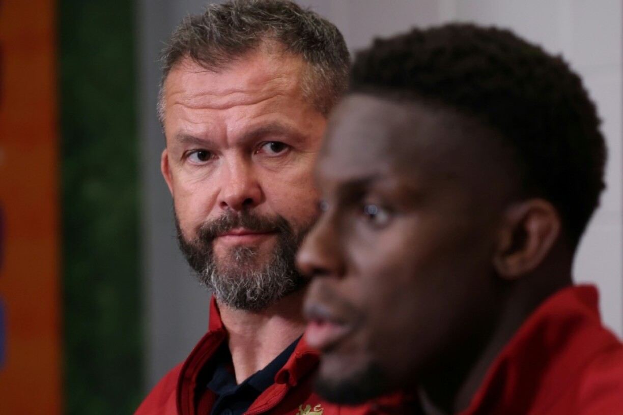 British and Irish Lions head coach Andy Farrell looks at captain Maro Itoje as he talks to reporters after the first Test win in Brisbane