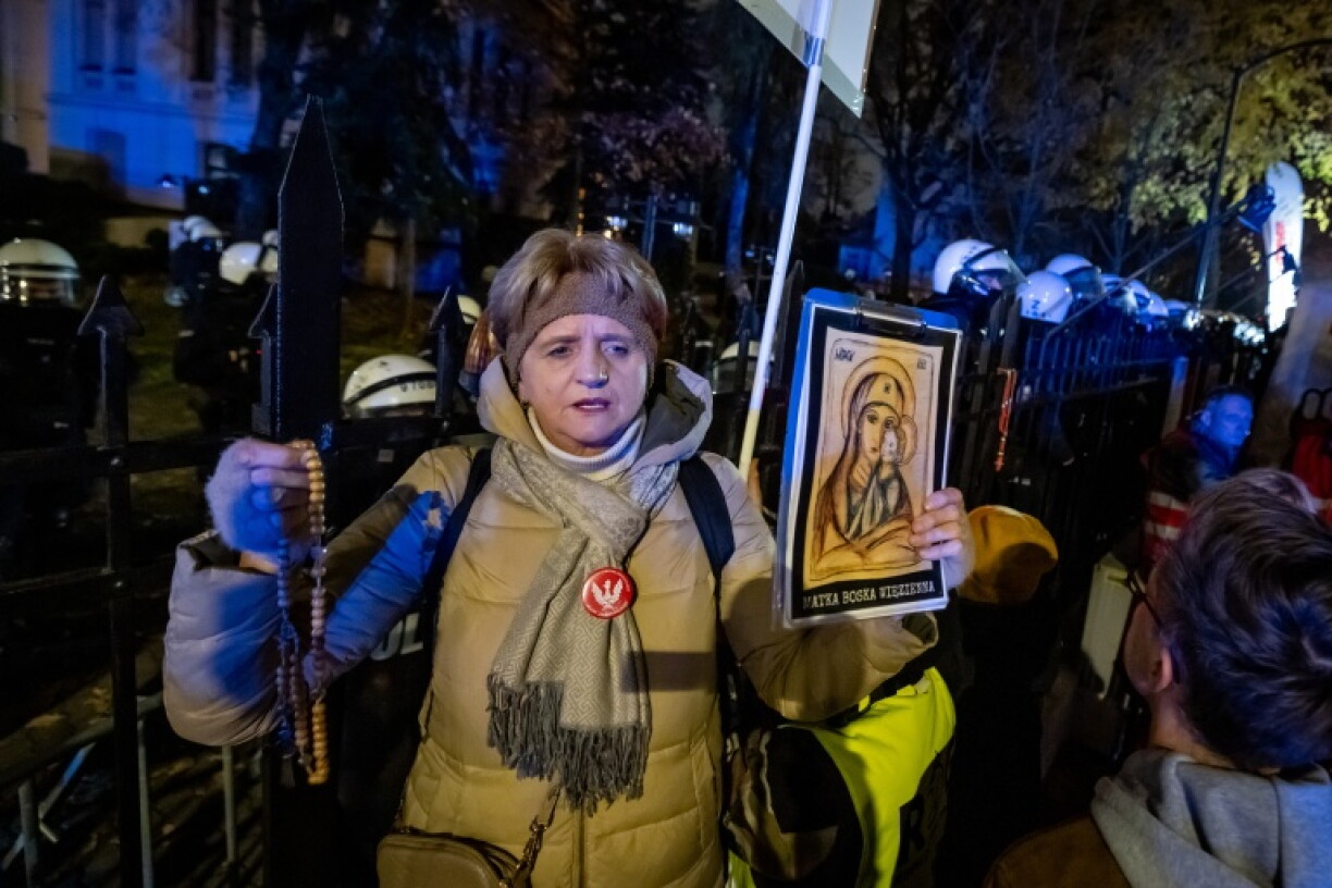 Some of those protesting said prayers while holding Roman Catholic rosaries and religious images